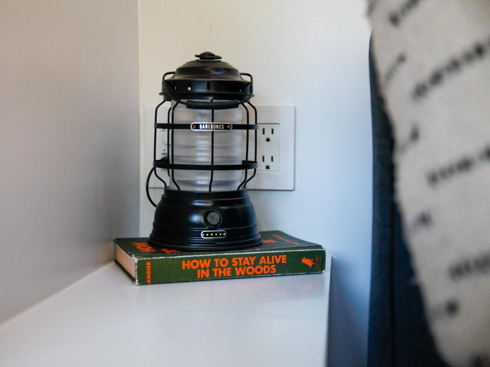 a light on top of books