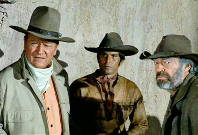 TUSCON - DECEMBER 18: RIO LOBO, theatrical movie originally released December 18, 1970.  Film directed by Howard Hawks. Pictured left to right, John Wayne (as Cord McNally), Jorge Rivero (as Pierre Cordona), and Jack Elam (as Mr. Phillips). Image is a frame grab. (Photo by CBS via Getty Images) 