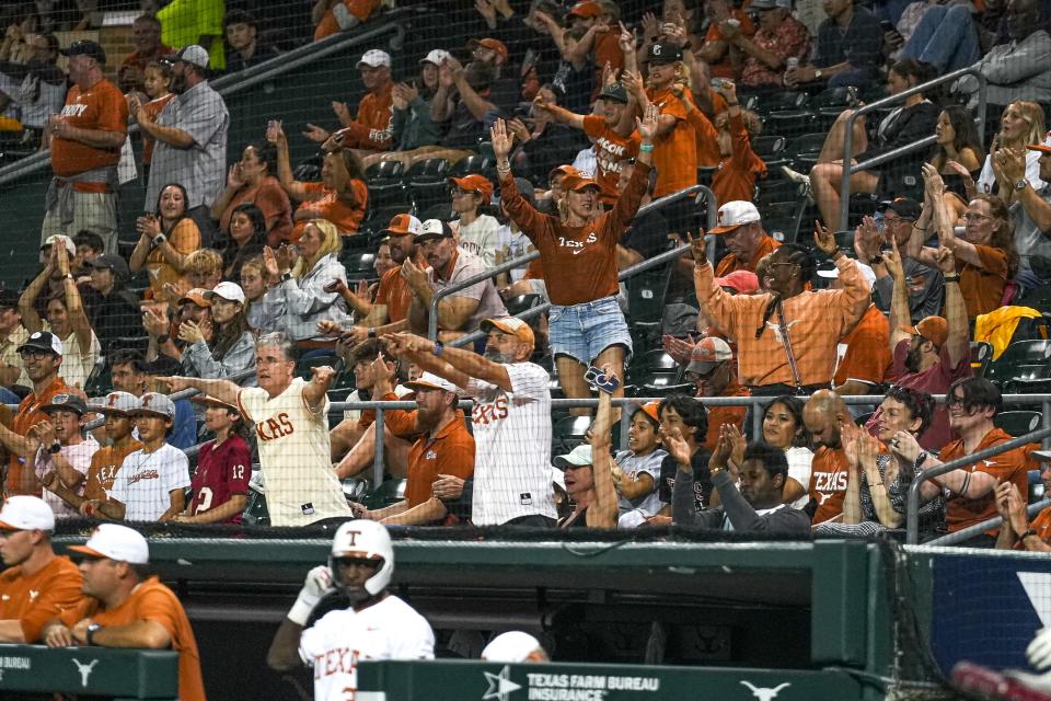 Texas fans celebrate a video review over a play that resulted in an Oklahoma State out during their May 3 game at UFCU Disch-Falk Field. Will fans be happy over Texas' choice to replace David Pierce as head baseball coach?