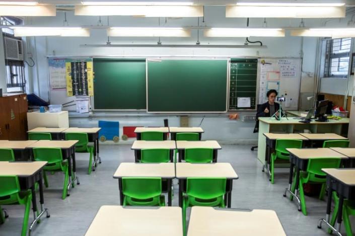 So far, 29 countries -- including Ireland, China, Italy, Poland and Japan -- have suspended classes nationwide, affecting nearly 400 million kids (AFP Photo/ISAAC LAWRENCE)