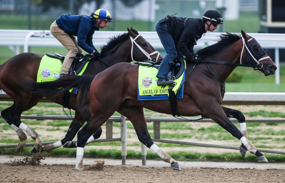 Kentucky Derby contenders Angel of Empire, on the outside, and Jace's Road, inside, breeze together at the track Saturday, April 29, 2023, the week before the Derby at Churchill Downs in Louisville, Ky. Both horses are trained by Brad Cox, who has four total contending in the Kentucky Derby May 6, 2023.