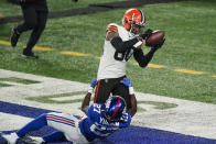Cleveland Browns' Jarvis Landry (80) catches a pass for a touchdown as New York Giants' Isaac Yiadom (27) defends during the first half of an NFL football game Sunday, Dec. 20, 2020, in East Rutherford, N.J. (AP Photo/Corey Sipkin)