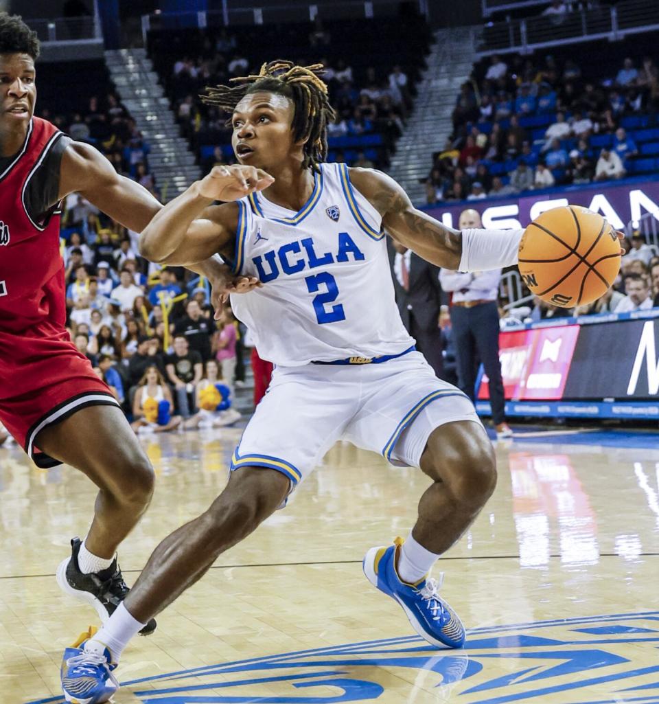 UCLA guard Dylan Andrews controls the ball during a game against Saint Francis in November.