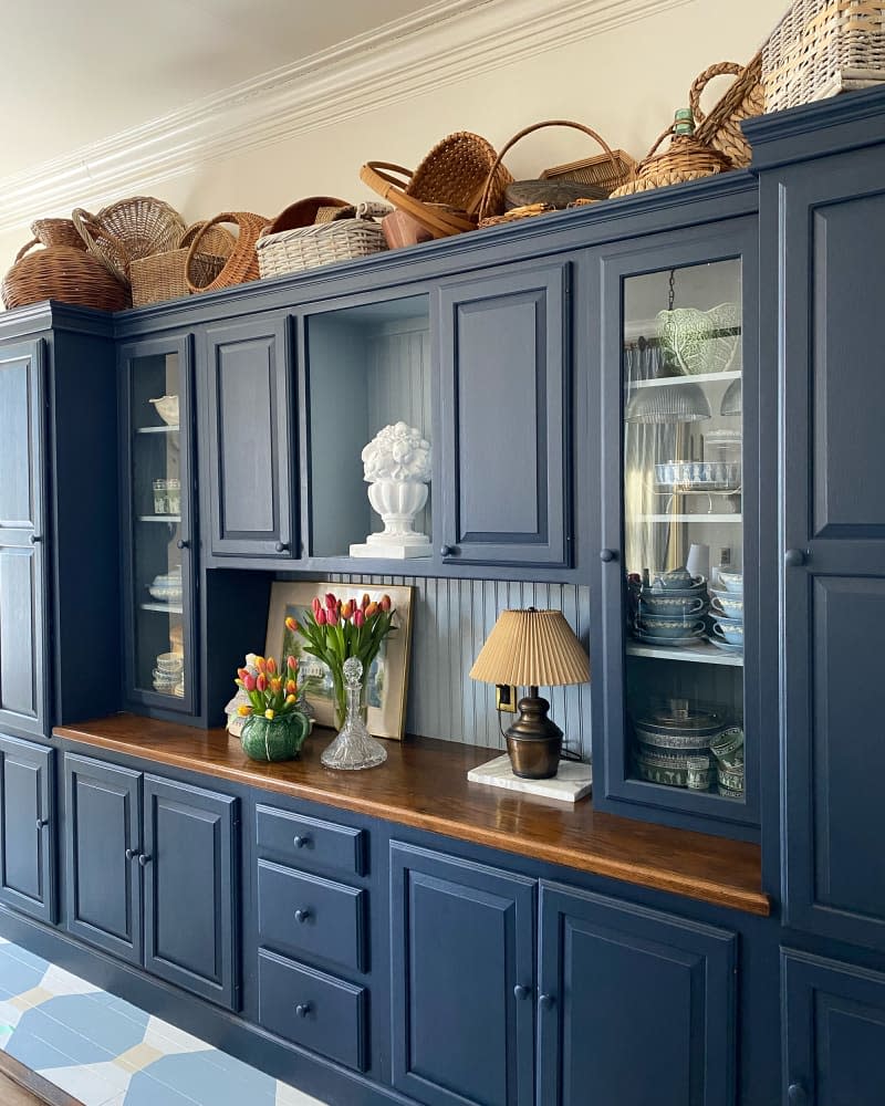 Blue storage cabinet in kitchen.