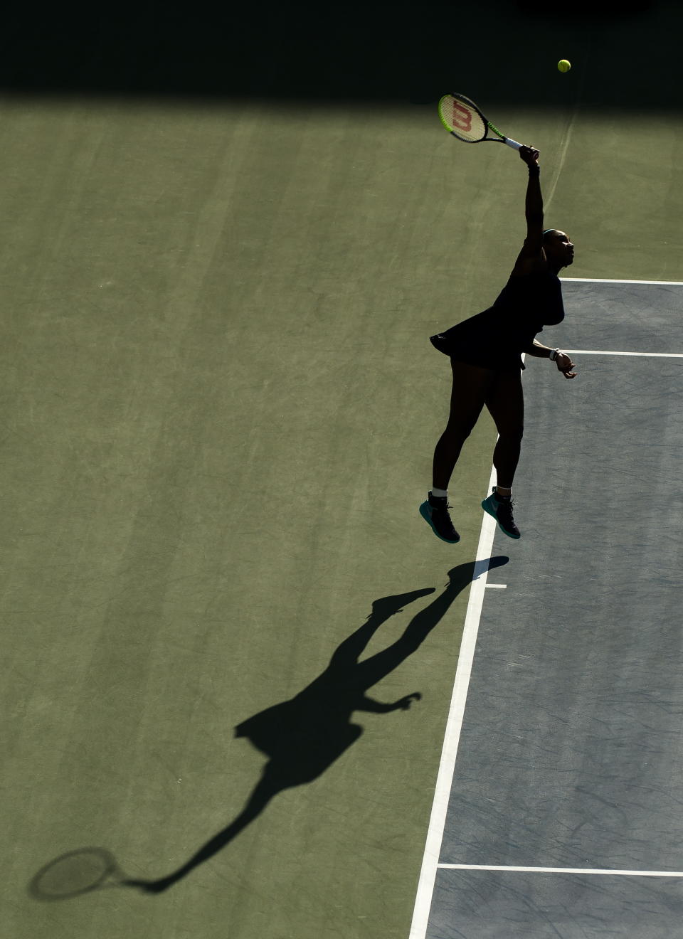 Serena Williams, of the United States, serves the ball against Marie Bouzkova, of the Czech Republic, during semifinal Rogers Cup tennis tournament action in Toronto, Saturday, Aug. 10, 2019. (Nathan Denette/The Canadian Press via AP)