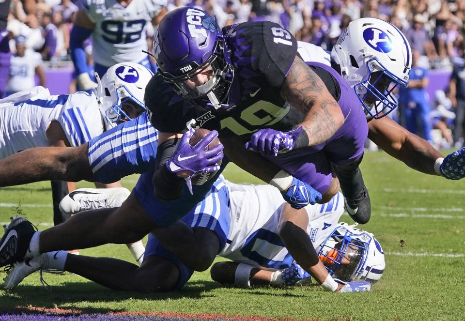 TCU tight end Jared Wiley scores a touchdown against BYU Saturday, Oct. 14, 2023, in Fort Worth, Texas. The Cougars’ defense had its roughest outing of the season against the Frogs. | LM Otero, Associated Press