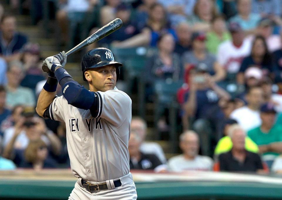 Derek Jeter stands with his bat primed for swinging during a baseball game