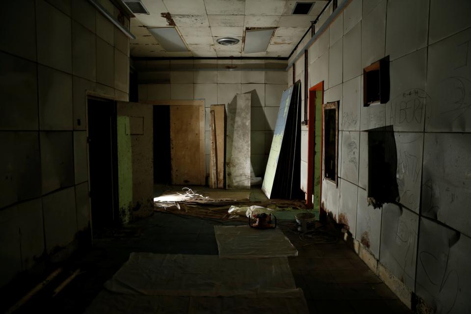 <p>Graffiti left by vandals covers the walls in the Briefing Room at the Combined Operations Centre, dating back to World War II, in the War Headquarters tunnels beneath Valletta, Malta, March 24, 2017. (Photo: Darrin Zammit Lupi/Reuters) </p>