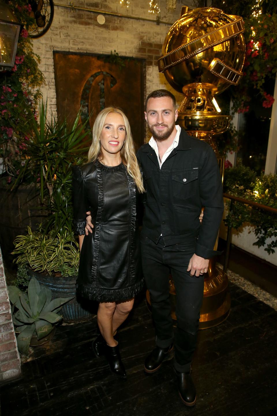 Sam Taylor-Johnson and Aaron Taylor-Johnson attend the HFPA and Hollywood Reporter Celebration of the 2020 Golden Globe Awards Season on Nov. 14.