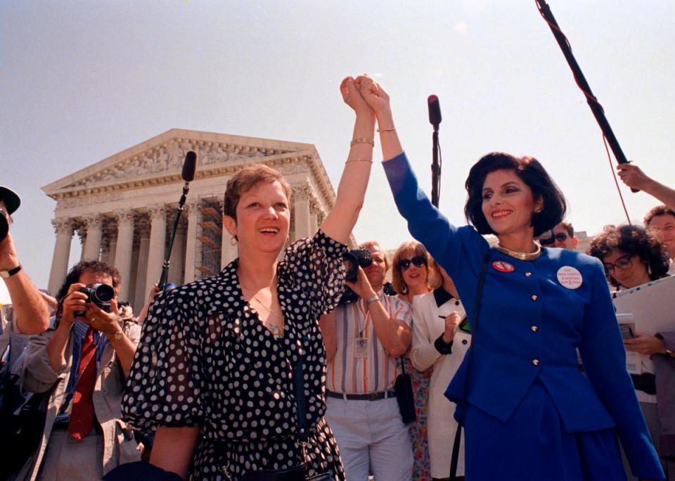 Norma McCorvey (left) outside the Supreme Court (1989 AP)