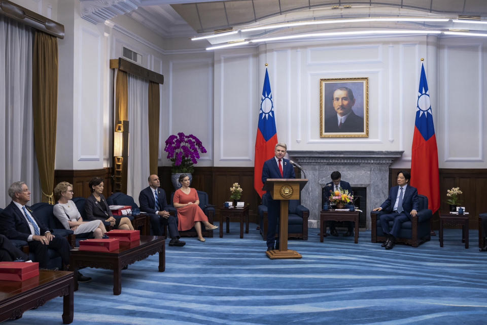 In this photo released by the Taiwan Presidential Office, Rep. Michael McCaul, R-Texas, center, delivers his speech during a meeting with Taiwan President Lai Ching-te, right, in Taipei, Taiwan, Monday, May 27, 2024. A U.S. congressional delegation met Taiwan's new leader on Monday in a show of support shortly after China held drills around the self-governing island in response to his inauguration speech. (Taiwan Presidential Office via AP)