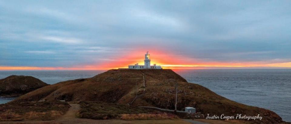 Western Telegraph: Strumble Head at sunset.