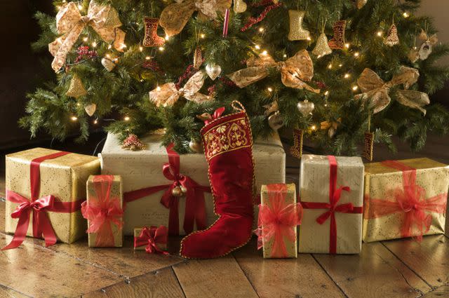 Miniature Christmas Decorations Leaning Against A Wall To Look Like A House  Entrance High-Res Stock Photo - Getty Images