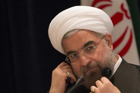 Iran's President Hassan Rouhani takes questions from journalists during a news conference in New York September 27, 2013. REUTERS/Adrees Latif