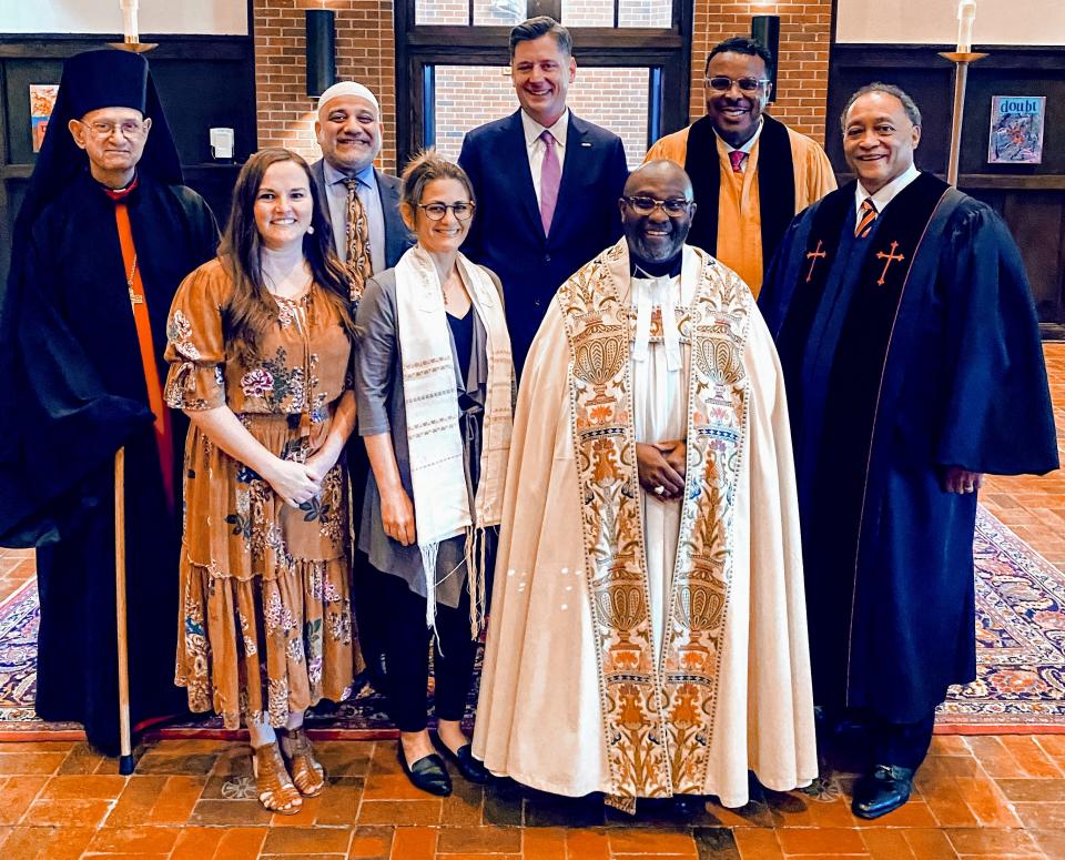Interfaith leaders pose for a picture with Oklahoma City Mayor David Holt after "A Prayer for Our City," an interfaith prayer service, on Sunday at Holt's home church, St. Augustine of Canterbury Episcopal Church. The event was held in celebration of Holt's second inauguration.