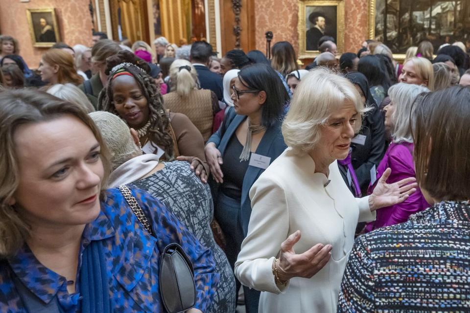 Camilla, Queen Consort hosts a reception, attended by Ngozi Fulani (CL) chief executive of the charity Sistah Space, to raise awareness of violence against women and girls as part of the UN 16 days of Activism against Gender-Based Violence, in Buckingham Palace