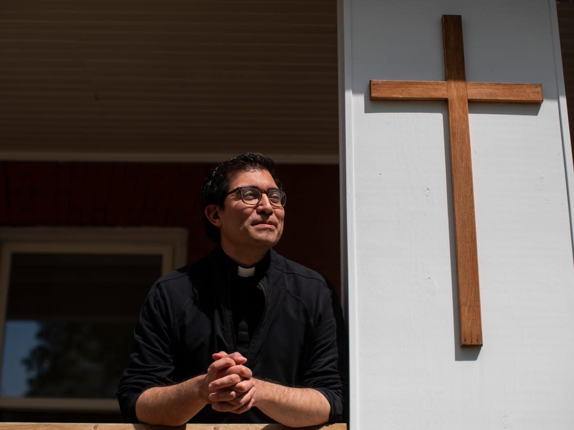 Father Cristino Bouvette, 36, a priest of mixed Italian, Métis and Cree heritage, will be the national liturgical director for the papal visit from July 24 to 29. (Jason Franson/The Canadian Press - image credit)