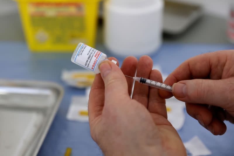 FILE PHOTO: Coronavirus disease (COVID-19) vaccination campaign in Calais