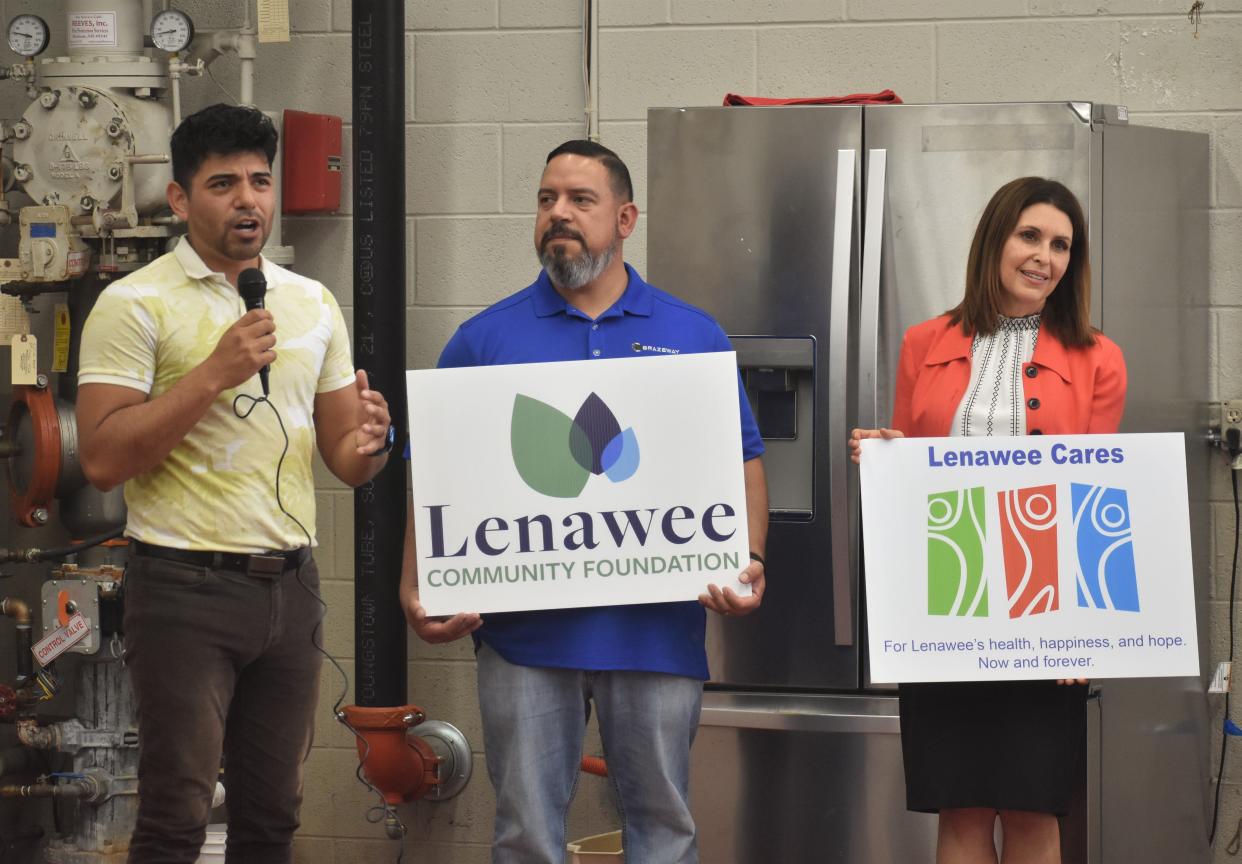 Jose Salazar, at left, talks about the importance of giving and generosity to the community during a presentation at Brazeway in Adrian, held in conjunction with the Lenawee Community Foundation, Wednesday, May 10, 2023. Bronna Kahle, the community foundation's president and CEO, is pictured at right. Salazar and Dan Solis, center, the product development engineering technician at Brazeway, will be the 2023 co-chairs of the Lenawee Cares annual campaign.