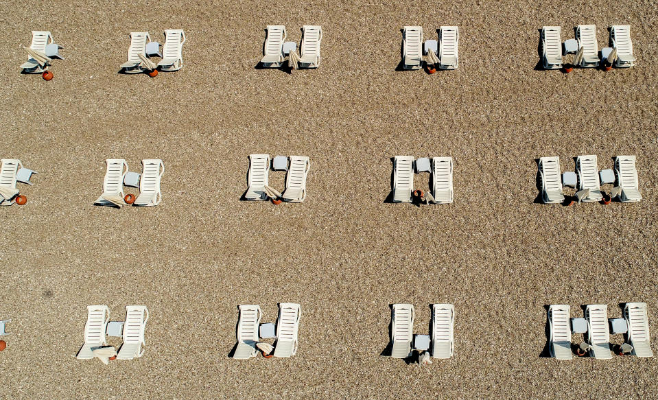 ANTALYA, TURKEY - MAY 28: An aerial view of sunbeds placed to comply the rules of social distance near Konyaalti Coastline within the coronavirus (Covid-19) pandemic measures in Antalya, Turkey on May 28, 2020. (Photo by Mustafa Ciftci/Anadolu Agency via Getty Images)