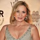 <div class="caption-credit"> Photo by: Getty images</div>Actress Kim Cattrall says she shies away from plastic surgery because she doesn't feel the need to look 20 years younger. At 54, she admits it's harder to stay fit than it used to be, but thanks to daily workouts and drinking eight cups of water, she still looks like <i>Sex and the City's</i> favorite man-eater here at Ryerson Theatre in Toronto on September 11, 2011. Think plastic surgery is freaky? Check out these five new boob jobs that are gaining popularity !