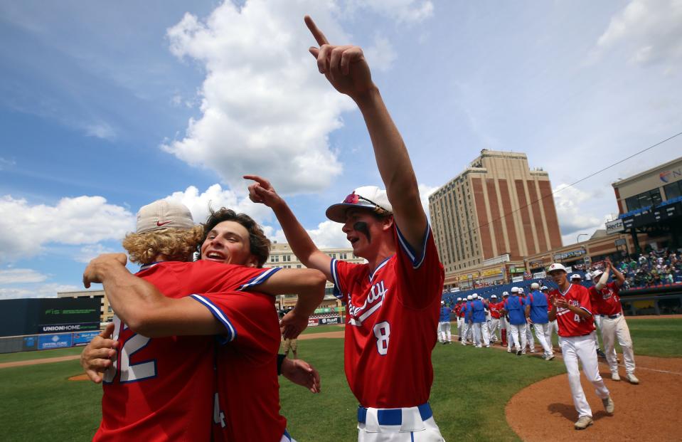 19. Grove City's Gavin Lawler, Braylon Boggs and Jackson Ware celebrate a 4-1 win over Mason in a Division I state semifinal June 10 at Canal Park in Akron. The Greyhounds wound up with a runner-up finish.