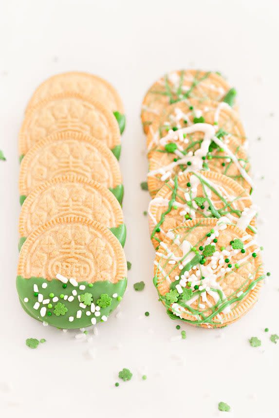 <p>If you're pressed for time, make these dip-and-go Oreos splattered with green-hued white chocolate. Break out the shamrock sprinkles if you got 'em!</p><p>Get the <strong><a href="https://go.redirectingat.com?id=74968X1596630&url=https%3A%2F%2Fsprinklesforbreakfast.squarespace.com%2Fsprinkles-for-breakfast%2Fst-patricks-day-oreos&sref=https%3A%2F%2Fwww.goodhousekeeping.com%2Ffood-recipes%2Fdessert%2Fg3262%2Fst-patricks-day-desserts%2F" rel="nofollow noopener" target="_blank" data-ylk="slk:St. Patrick's Day Oreos recipe;elm:context_link;itc:0;sec:content-canvas" class="link ">St. Patrick's Day Oreos recipe</a> </strong>from Sprinkles for Breakfast. </p>