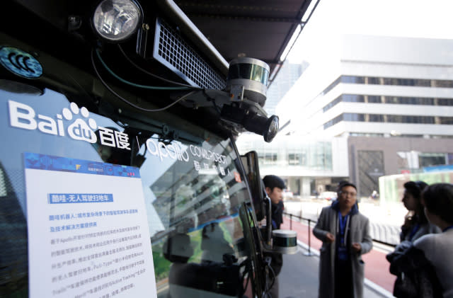 A camera is seen on the head of a self-driving sweeper car with Baidu's Apollo autonomous driving open platform at the 2018 Baidu World conference and exhibit to showcase its latest AI technology in Beijing, China, November 1, 2018. REUTERS/Jason Lee - RC1B1D44A540