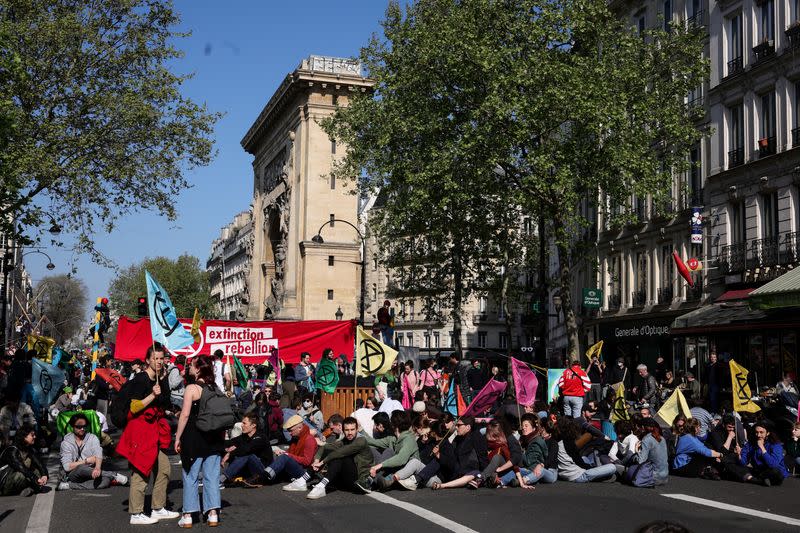 Extinction Rebellion activists hold protest in Paris, urging presidential candidates to act on climate change