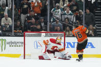 Calgary Flames goaltender Dan Vladar stops a shot by Anaheim Ducks' Trevor Zegras during the shootout in an NHL hockey game Friday, Dec. 3, 2021, in Anaheim, Calif. The Flames won 4-3. (AP Photo/Jae C. Hong)