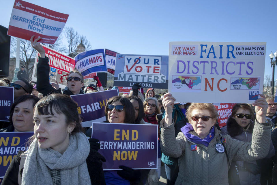 <div class="inline-image__caption"><p>Protesters attends a rally for “Fair Maps” on March 26, 2019, in Washington, D.C.</p></div> <div class="inline-image__credit">Tasos Katopodis/Getty</div>