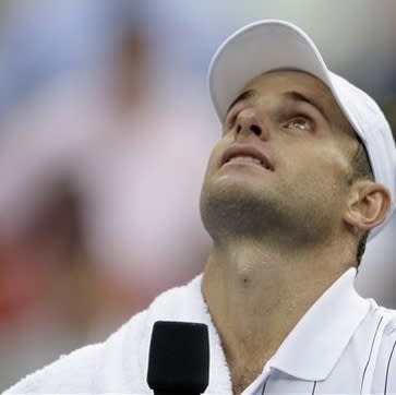 Andy Roddick looks up after losing the final match of his career to Argentina's Juan Martin del Potro in the fourth round of the 2012 US Open. (AP Photo/Darron Cummings)