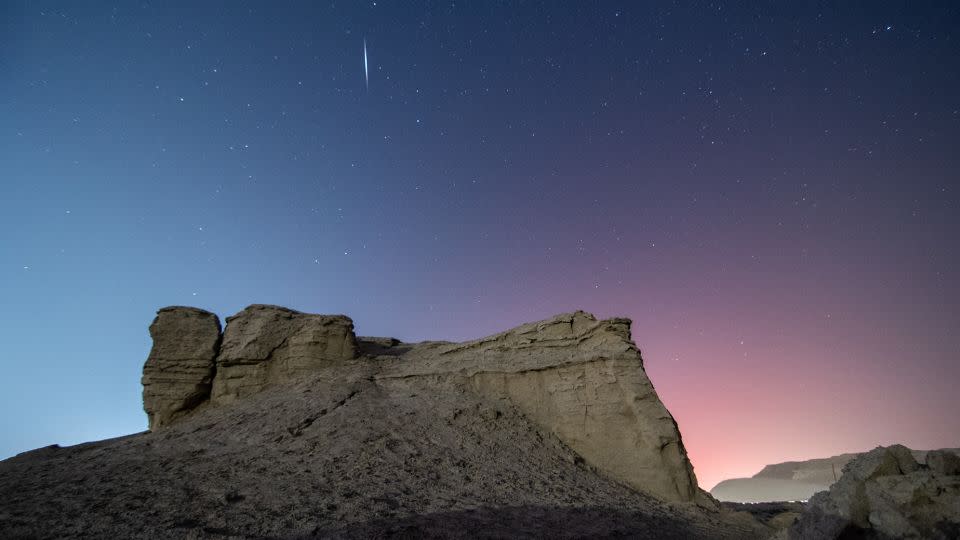 The Quadrantid meteor shower is seen in the night sky over the city of Korla in China's Bayingolin Mongolian Autonomous Prefecture, on January 4, 2022. - Xue Bing/Costfoto/Future Publishing/Getty Images