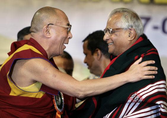 Fernandes in Bangalore in 2008, greeted by his friend the Dalai Lama (Getty)