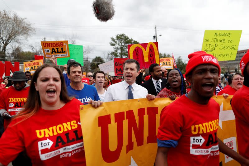 Democratic U.S. presidential candidate and former South Bend Mayor Pete Buttigieg marches with striking McDonald's workers while campaigning in Charleston