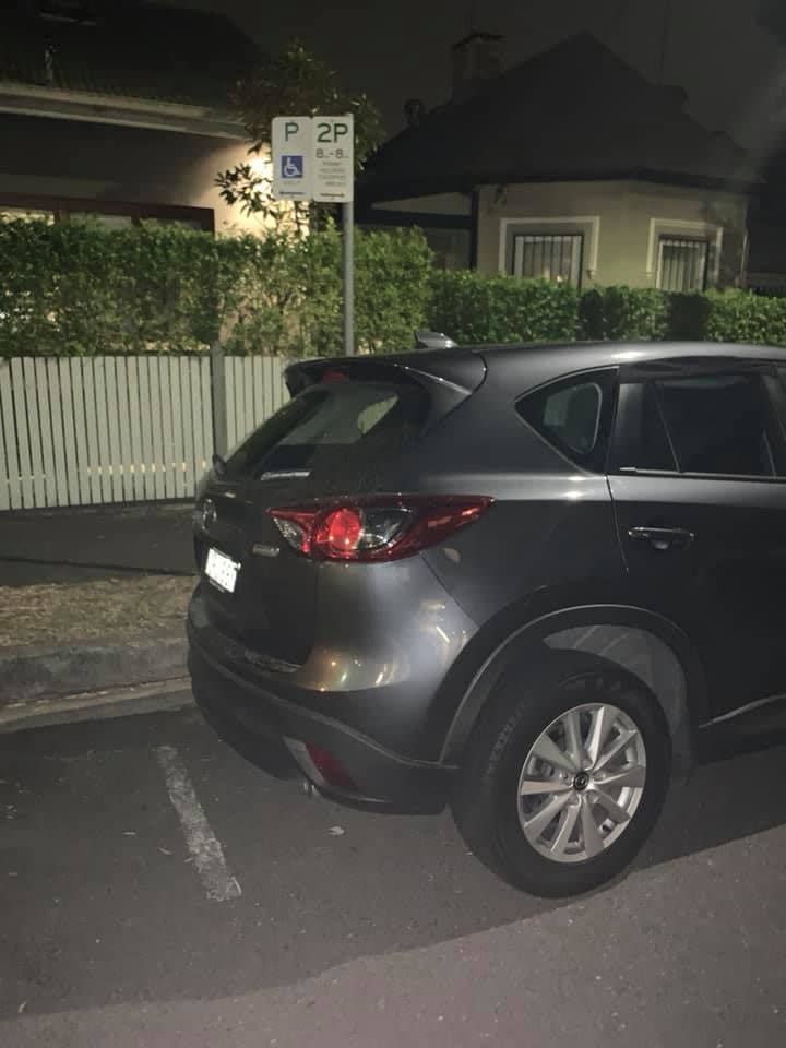 Pictured is a Mazda car in Sydney that was fined for parking in a disabled spot. 