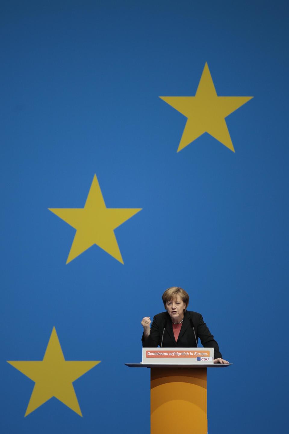 German Chancellor Angela Merkel delivers her keynote speech during the German ruling Christian Democratic Union party's convention ahead of the European Parliament elections in Berlin, Saturday, April 5, 2014. European Parliament elections are scheduled for May 2014. (AP Photo/Markus Schreiber)