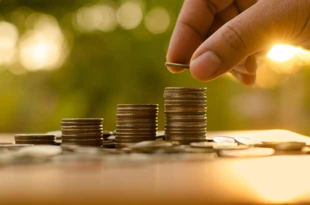 CBC finance columnist Mark Ting says saving is good, but those savings will have a greater impact if they're invested.  (Shutterstock/Singkham - image credit)