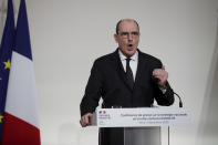 French Prime Minister Jean Castex speaks during a press conference to outline France's strategy for the deployment of future COVID-19 vaccines, in Paris, Thursday Dec. 3, 2020. French Prime Minister Jean Castex said the first doses of COVID-19 vaccines will go to nursing homes residents when they will be available in the country, not before the end of the month. (Benoit Tessier/Pool via AP)