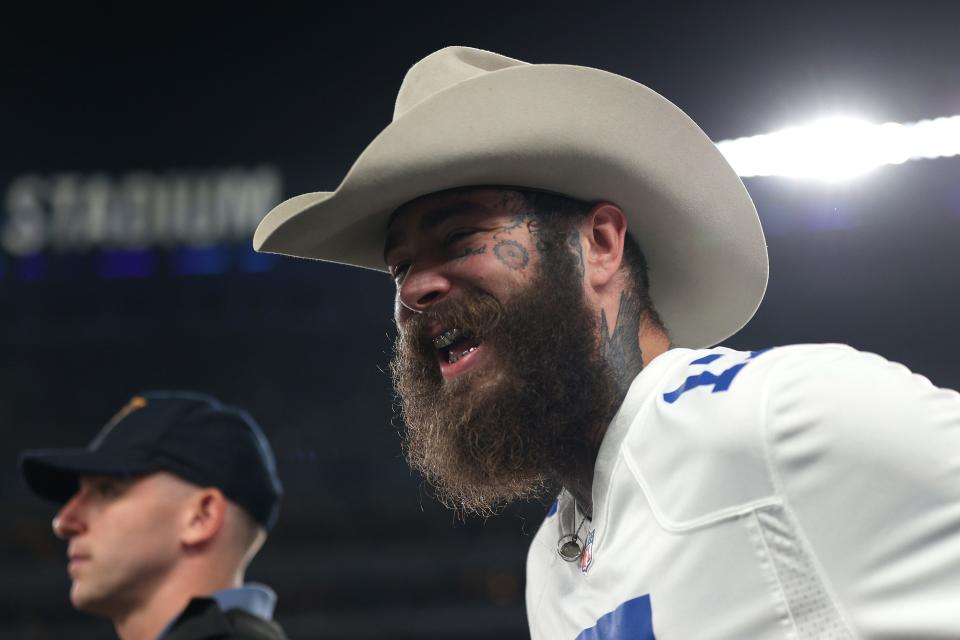 EAST RUTHERFORD, NEW JERSEY – SEPTEMBER 26: Singer Post Malone looks on before the game between the New York Giants and the Dallas Cowboys at MetLife Stadium on September 26, 2024 in East Rutherford, New Jersey. (Photo by Sarah Stier/Getty Images)