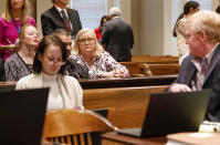 Alex Murdaugh looks back toward his family, including his sister Lynn Murdaugh Goette during a break in his double murder trial at the Colleton County Courthouse in Walterboro, S.C, Wednesday, Jan. 25, 2023. (Grace Beahm Alford/The State via AP)