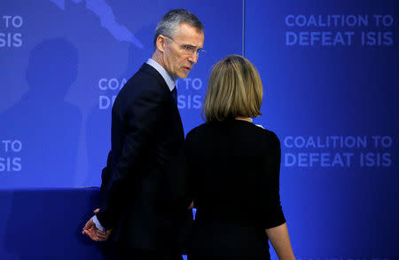 European Union Foreign Minister Federica Mogherini speaks with NATO Secretary General Jens Stoltenberg during the Global Coalition - Working to Defeat ISIS at the State Department in Washington, DC, U.S., March 22, 2017. REUTERS/Joshua Roberts