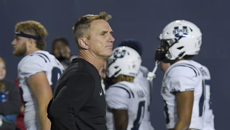 Utah State coach Blake Anderson watches as players walk off the field after losing to James Madison Saturday, Sept. 23, 2023, in Logan, Utah. 