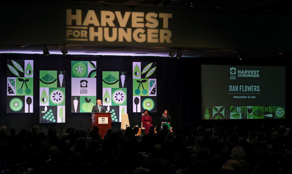 Akron-Canton Regional Foodbank President and CEO Dan Flowers addresses the audience Tuesday during the Akron-Canton Regional Foodbank's Harvest for Hunger campaign kickoff breakfast at the John S. Knight Center in Akron.