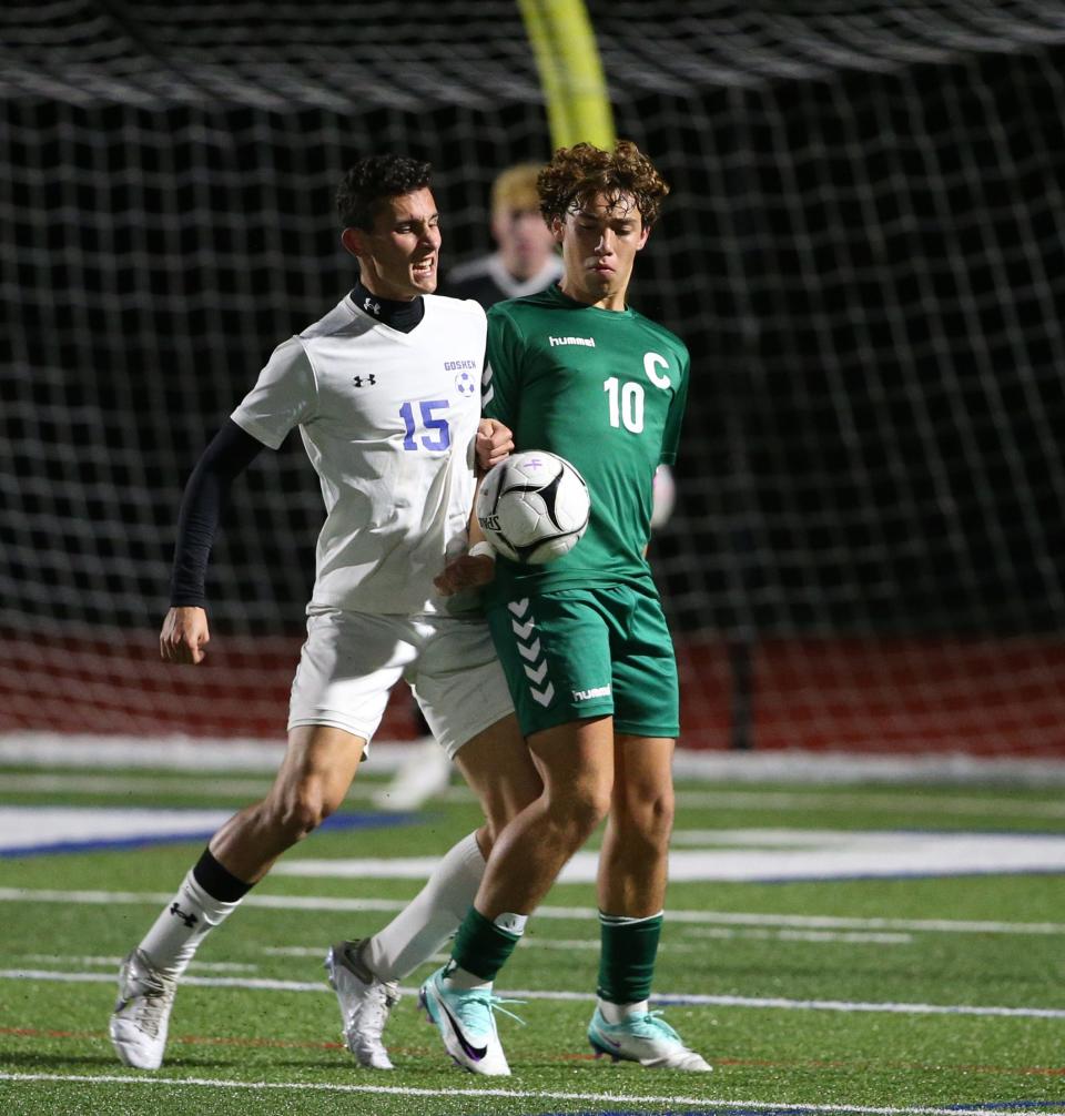 Cornwall's Slav Mishkovski and Goshen's Aidan Diglio trap the ball during the Section 9 Class AA championship on October 30, 2023.