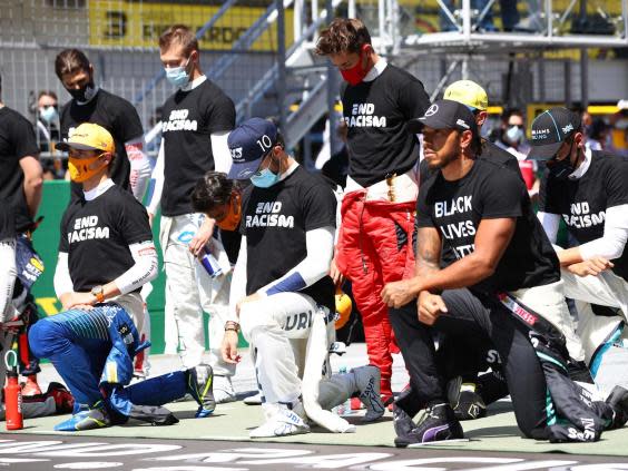 Lewis Hamilton takes a knee before the Austrian Grand Prix but six drivers choose not to (Getty)