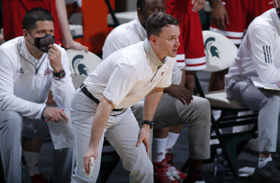 Indiana coach Archie Miller stands in the bench area during the second half of the team's NCAA college basketball game against Michigan State, Tuesday, March 2, 2021, in East Lansing, Mich. Michigan State won 64-58. (AP Photo/Al Goldis)