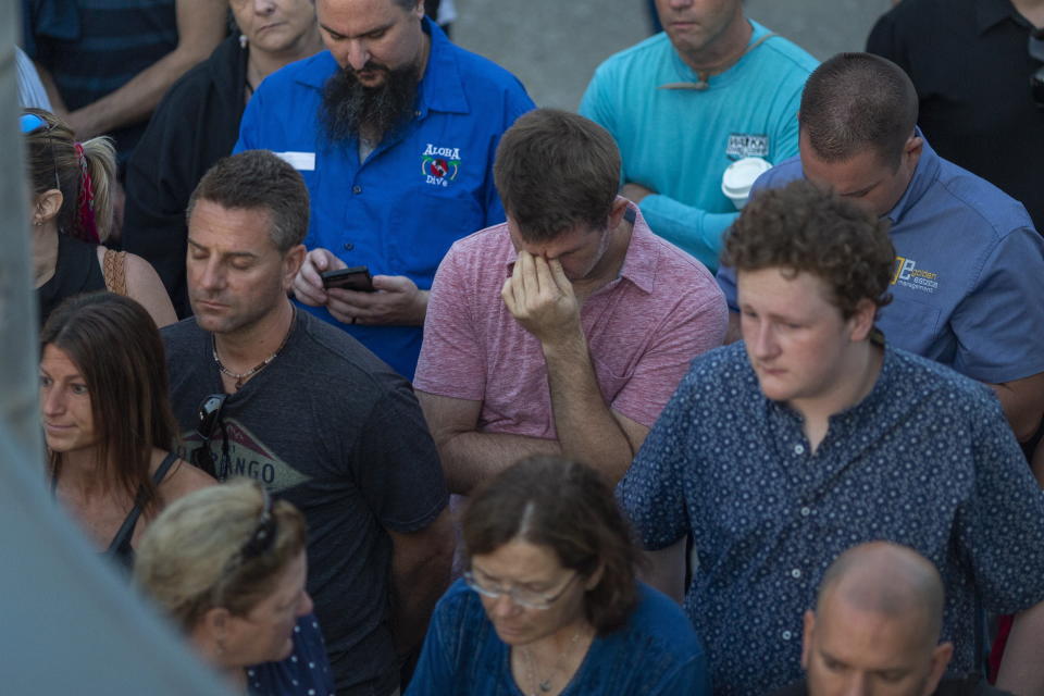 People attend a public vigil for the 34 victims of the fire aboard the 75-foot commercial diving boat Conception, which burned and sank off the coast of Santa Cruz Island; in Santa Monica, California.