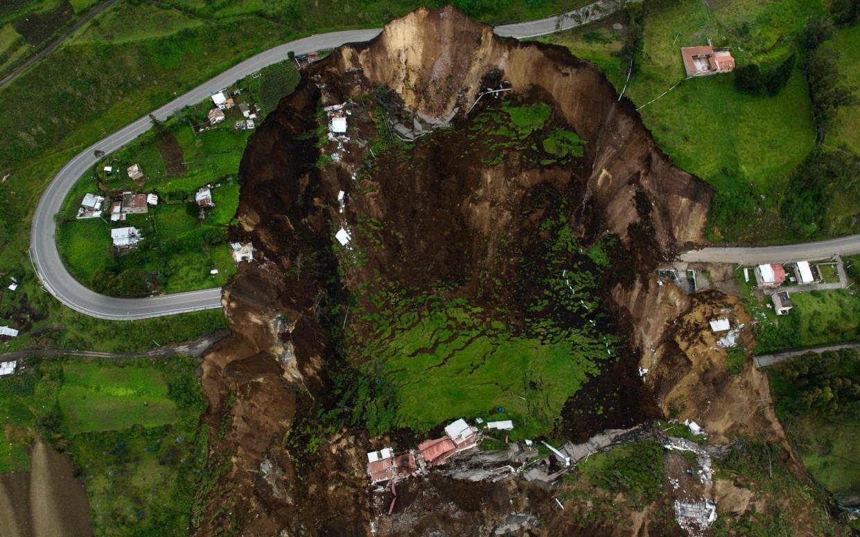 Aerial view of the zone affected by a landslide in Alausi, Ecuador, on Sunday night - AFP via Getty Images/AFP via Getty Images