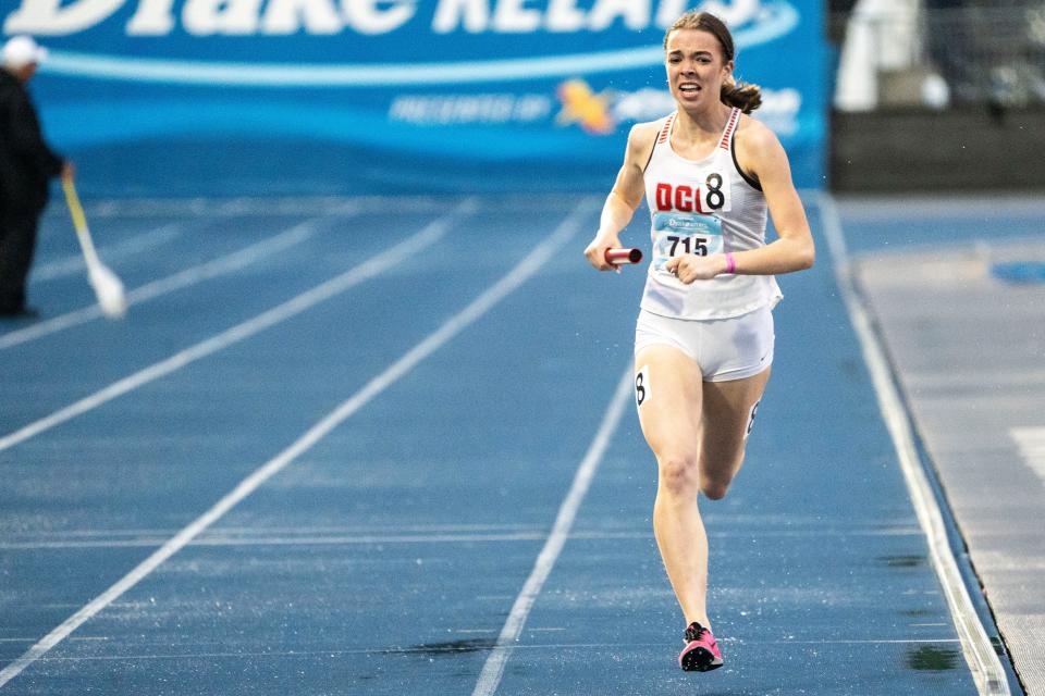 DCG's Tess Meggison runs the 4x400 meter relay during the Drake Relays at Drake Stadium on Saturday, April 27, 2024, in Des Moines.